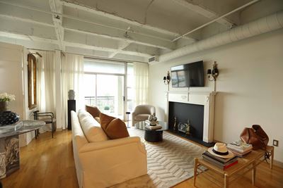 Large open living room with huge windows